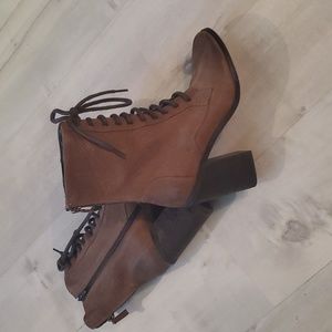 Lace up leather boots by Boutique 9.